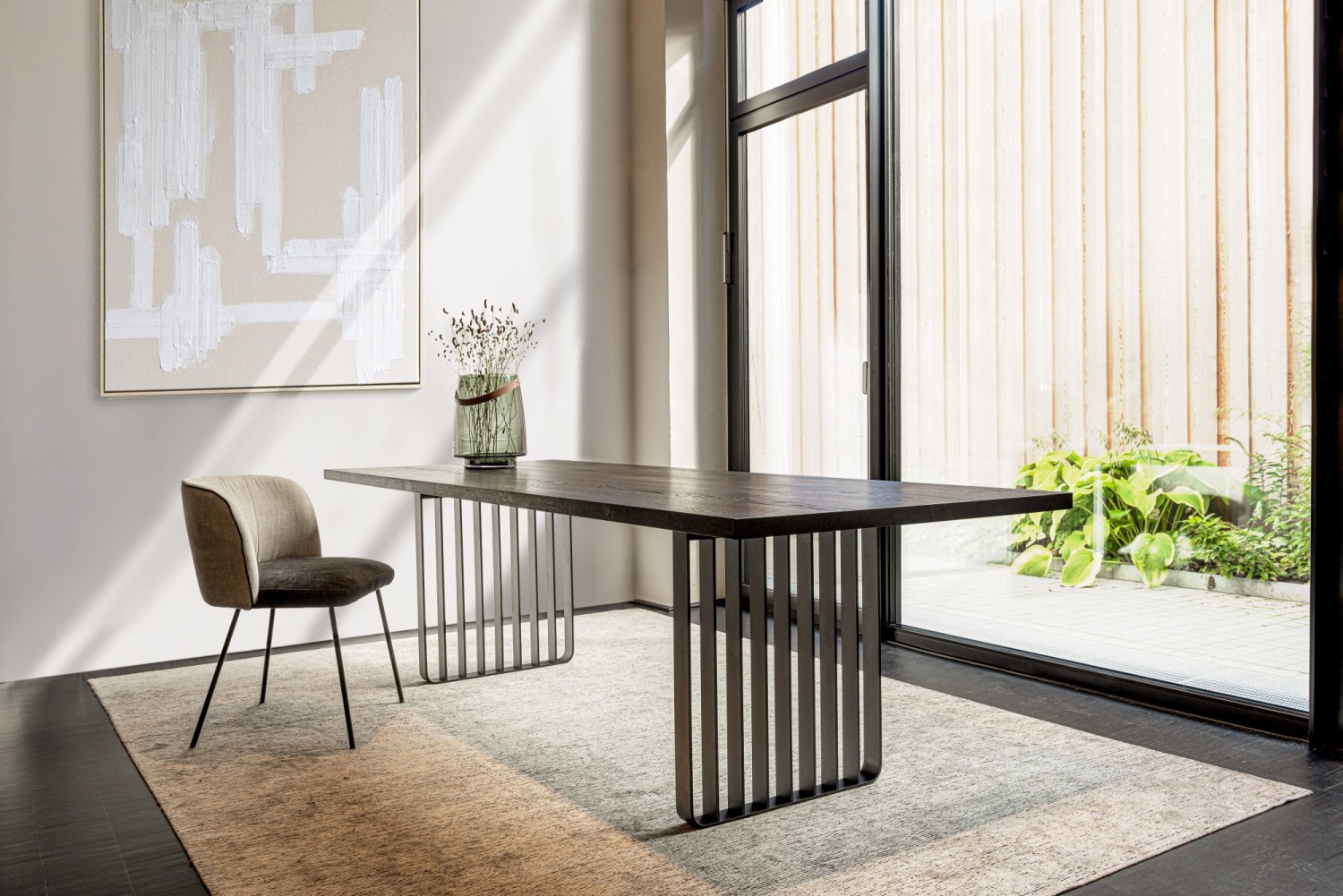 Gaia Line chair KFF at black Lamello table ASCO on grey carpet