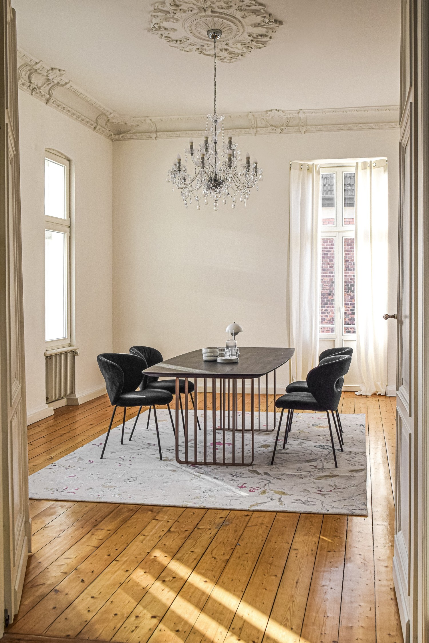 Dark blue KFF ALICE chairs around ASCO Lamello table in old building