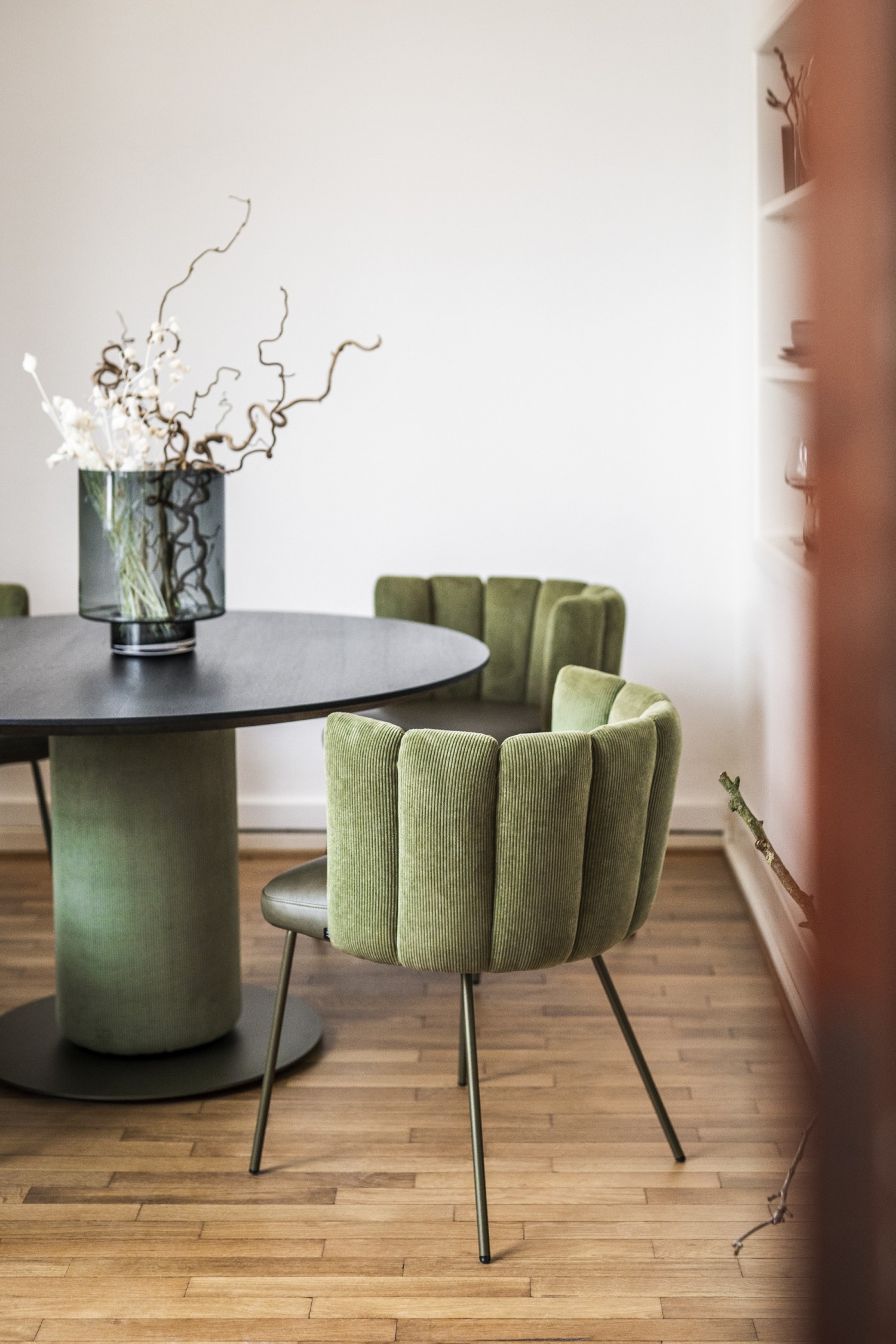 Green Gaia chairs KFF around Gaia round dining table with black wooden top ASCO