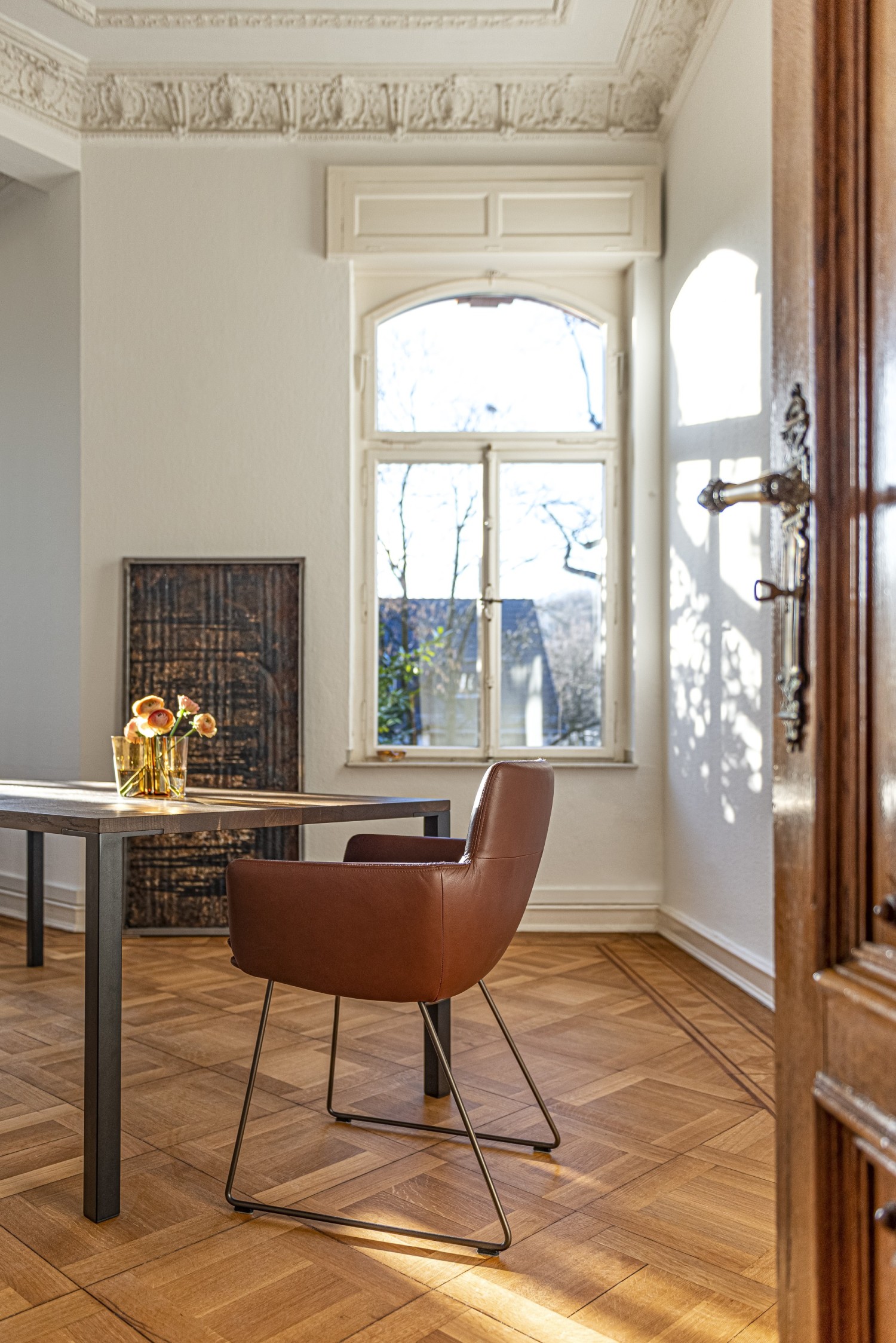 Faye chair with armrests KFF at Ferrro_line table ASCO in old building