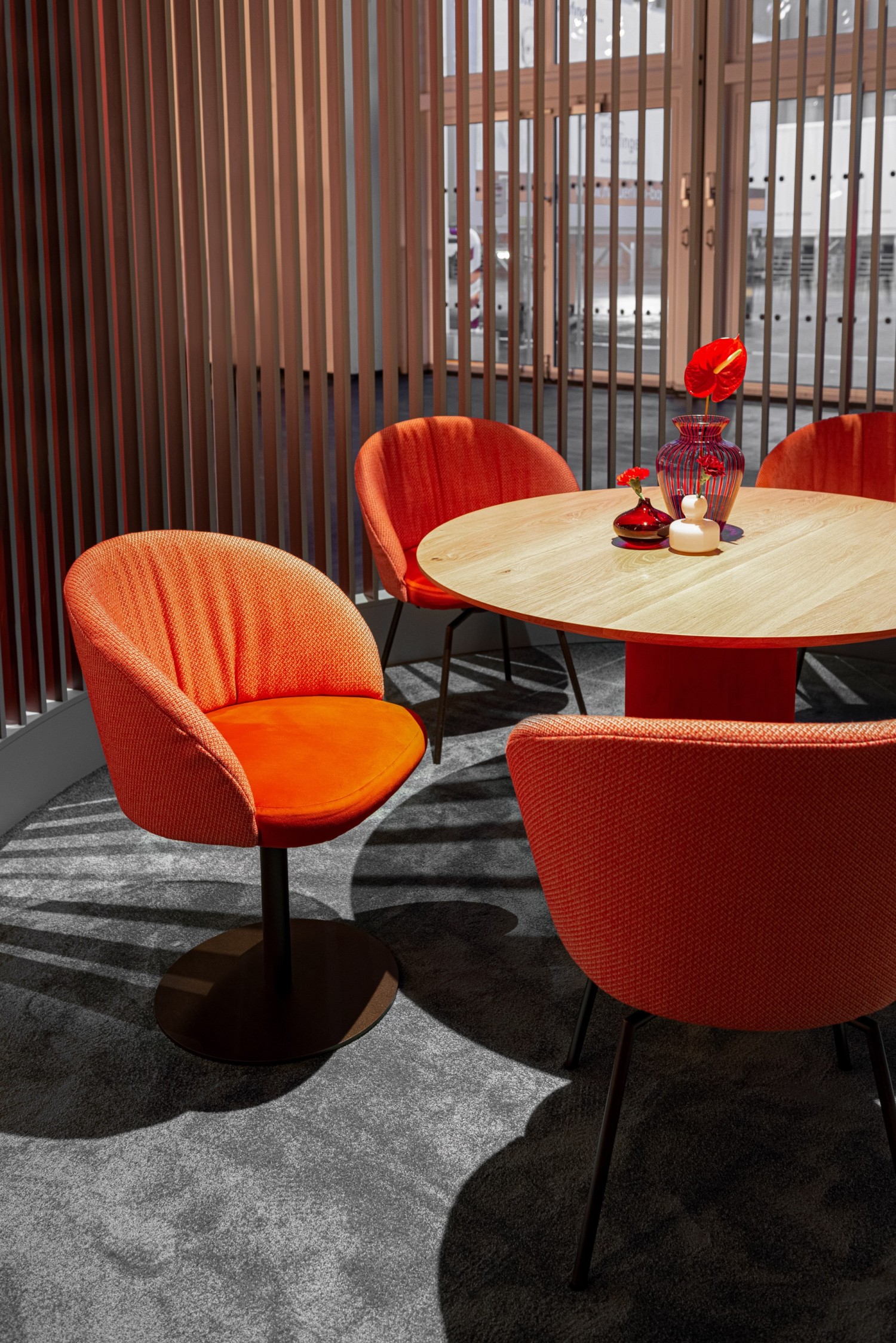 GIRO chair in orange fabric on a swivel base with return mechanism