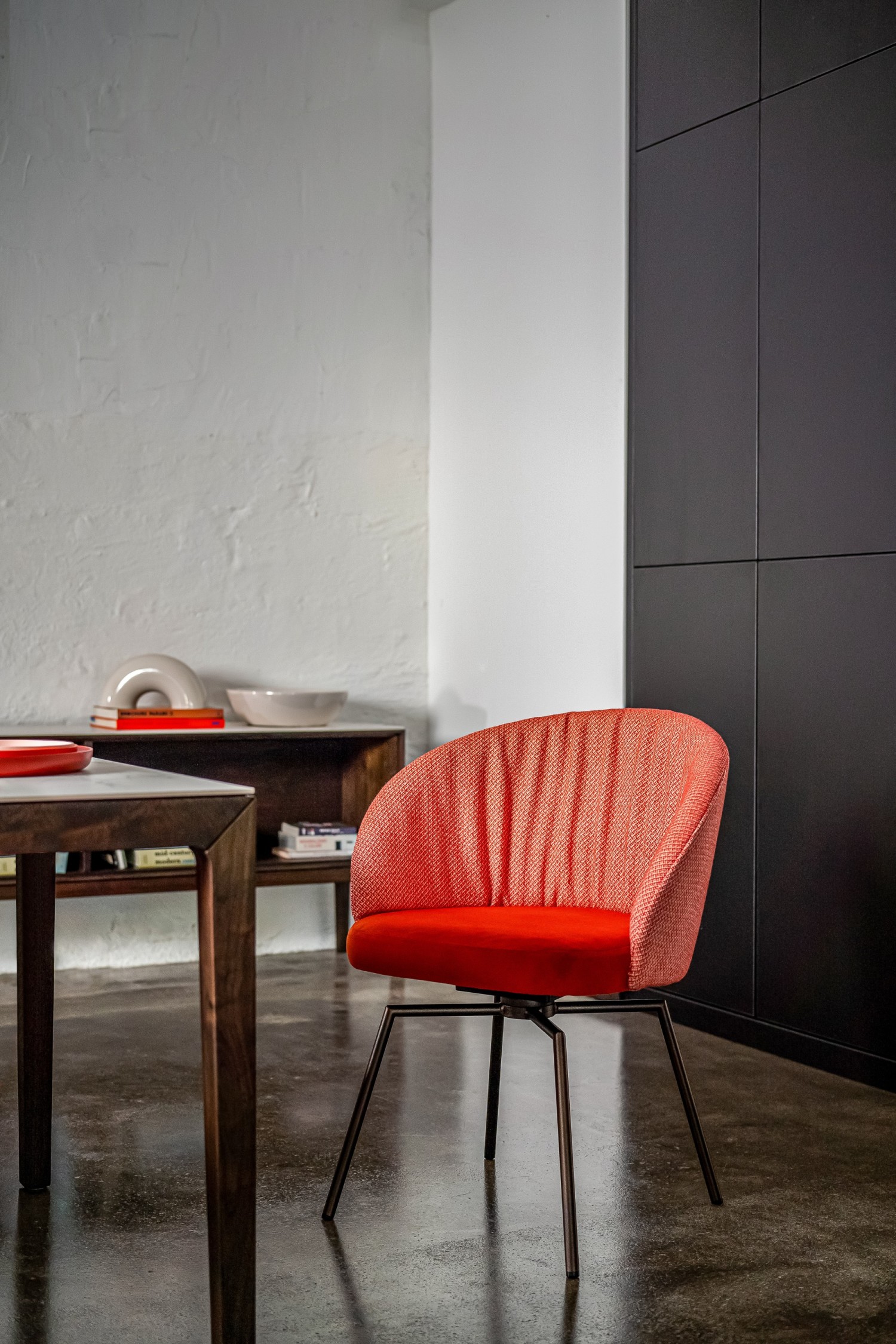 GIRO chair in orange fabric on a swivel base with return mechanism