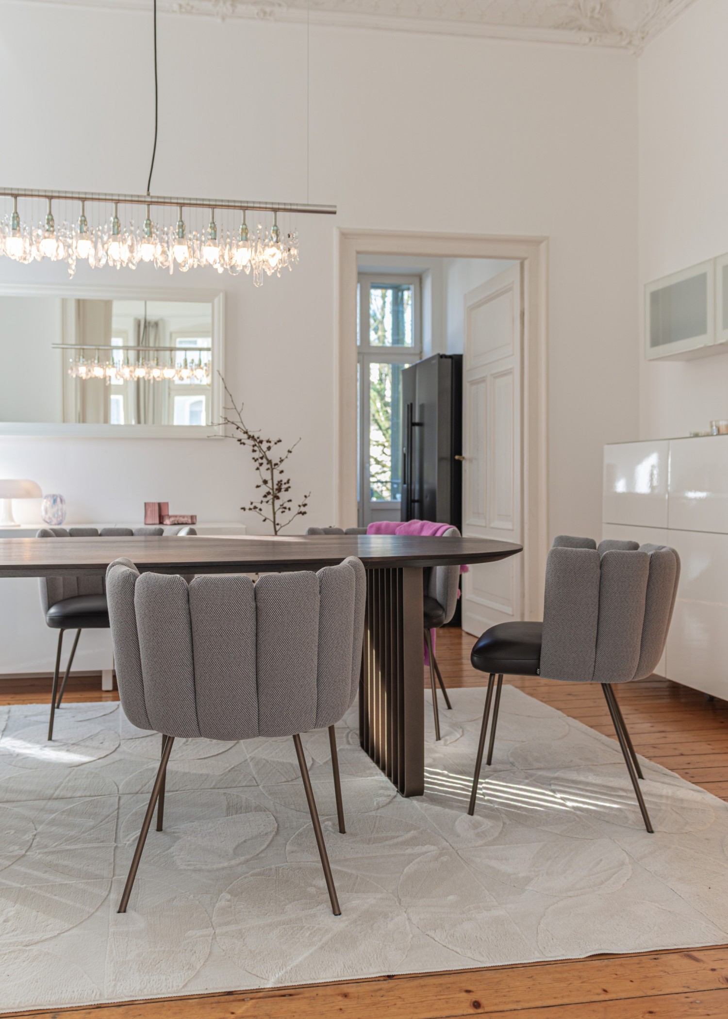 Gaia chairs in Rohi fabric around oval ASCO Lamello table