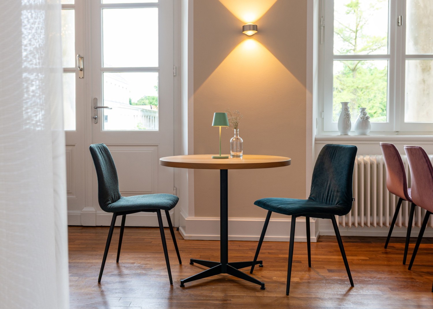 Cross Round ASCO bistro table with KFF Maverick chairs in velvet